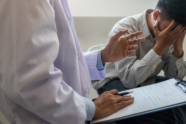 man struggling with science and addiction